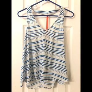 Blue/white stripe tank with neon coral accent.